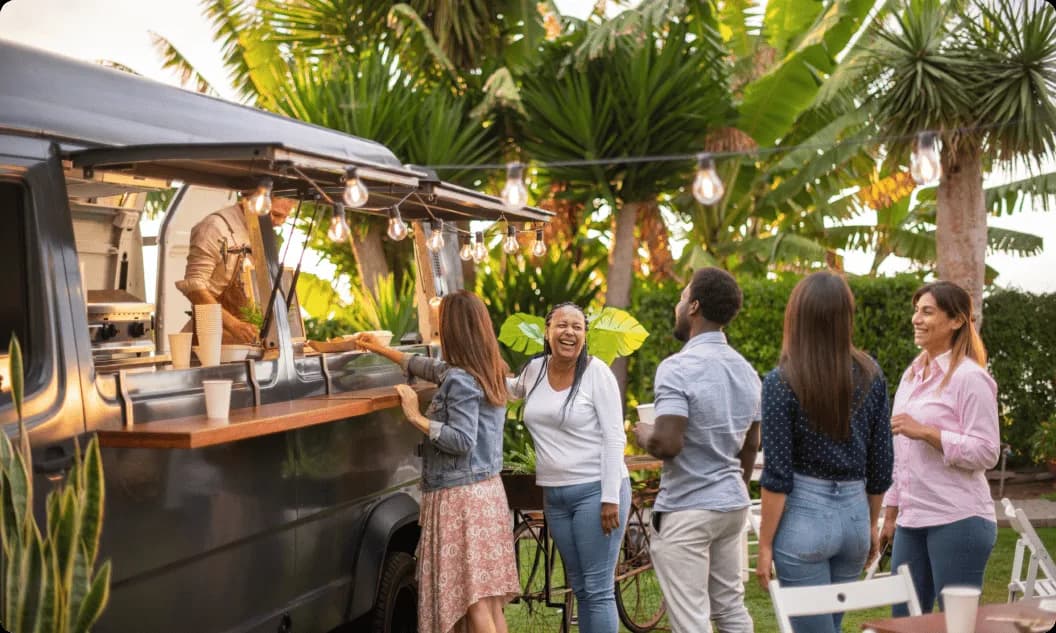 Guests enjoying a food truck at an outdoor event
